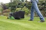 Mowing stripes onto a lawn